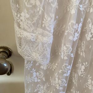 Preowned dressy lace dress in fair condition.